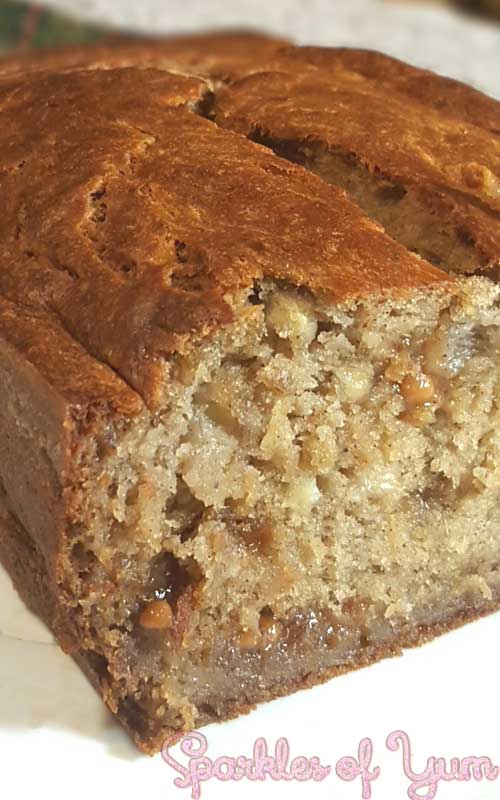 A finished Pumpkin Spice Caramel Banana Bread cut open to show the interior texture.