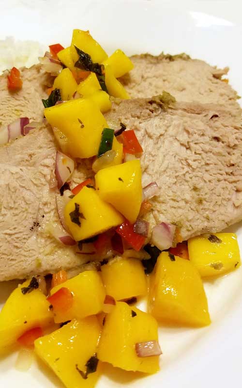 This recipe for Jamaican Pork Tenderloin with Mango Habanero Salsa will knock your socks off with it's Caribbean blend of spicy peppers and tropical sweetness.
