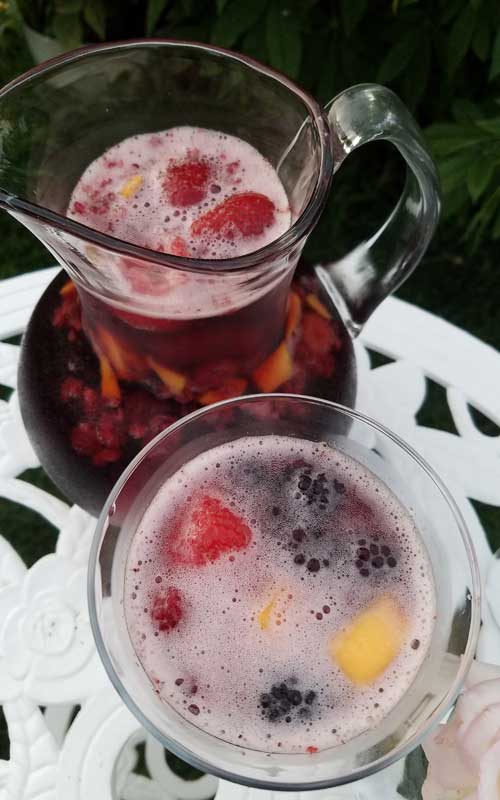 This recipe for Sparkling Mango Berry Sangria is a perfect and super-simple way to celebrate summer, or any day for that matter.