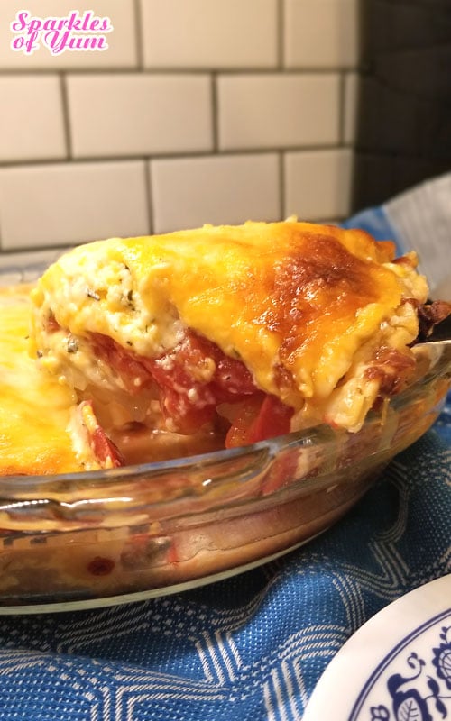 Recipe for Tomato Pie - This Tomato Pie recipe is just creamy, cheesy, tomato'y goodness in a pie crust. Bursting with the flavor of home grown tomatoes. I would almost dare to call this a TRUE pizza pie.