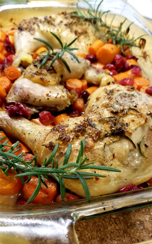 Need an elegant dinner that's simply delicious and easy? We have got just the dish for you, our recipe for Rosemary Chicken Over Cranberries & Carrots!
