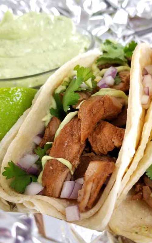 Carne Adovada Street Tacos Recipe - Looks like a misspelling of Avocado, it's not. This is what it's called, and it's the most tender, moist and flavorful Pork Tacos we've ever had! We also made an awesome Creamy Avocado Cilantro Lime Dressing to top it off with.
