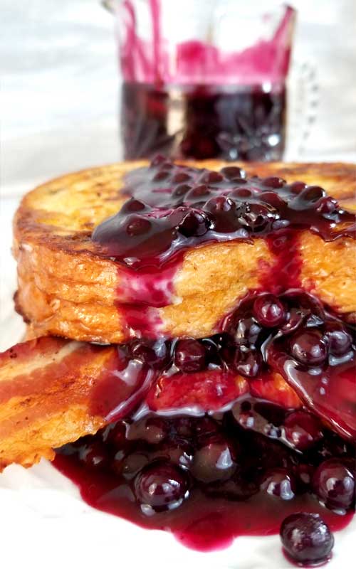 Oh my heavens! This Blueberry and Bacon French Toast recipe is my new obsession! Weekend brunch, holiday breakfast or breakfast for dinner, I'll take any and all if this is on the table!