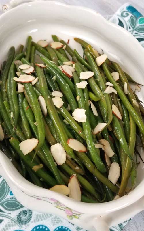 French Green Beans with Almonds Recipe - French Green Beans that are buttery and nutty, with a hint of lemon and garlic for some extra tasty goodness!