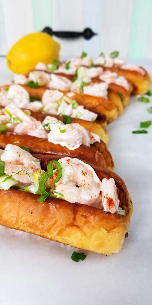 Sweet shrimp slathered in a lemon dill mayo sauce, all jammed into a potato roll. It's like taking your taste buds on a trip to a New England beach, all without leaving town. 