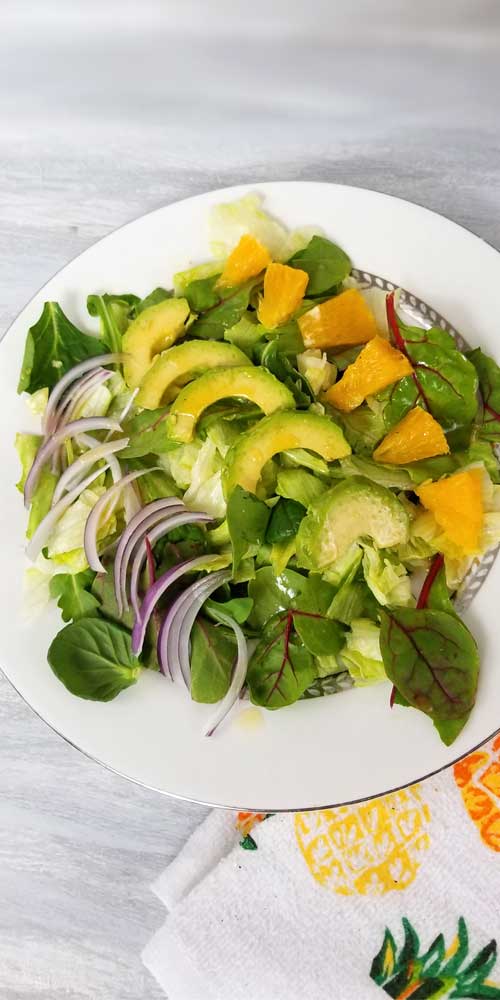 An absolutely divine gathering of fresh summer flavors come together in this Cuban Avocado & Citrus Salad with a Honey Lemon Dressing that's just bursting with vibrant healthy flavors and ingredients that you may already have on hand or at least are easy to find.