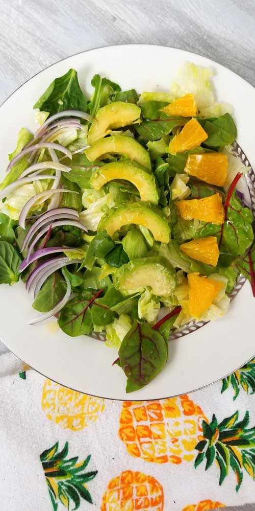 An absolutely divine gathering of fresh summer flavors come together in this Cuban Avocado & Citrus Salad with a Honey Lemon Dressing that's just bursting with vibrant healthy flavors and ingredients that you may already have on hand or at least are easy to find.