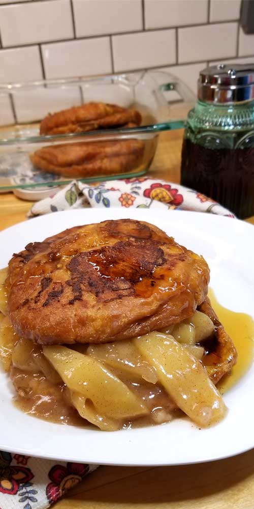 Decadently delicious Apple Pie Croissant French Toast, is pure buttery goodness filled with tender fried cinnamon apples, perfect for a fall brunch or special holiday breakfast.