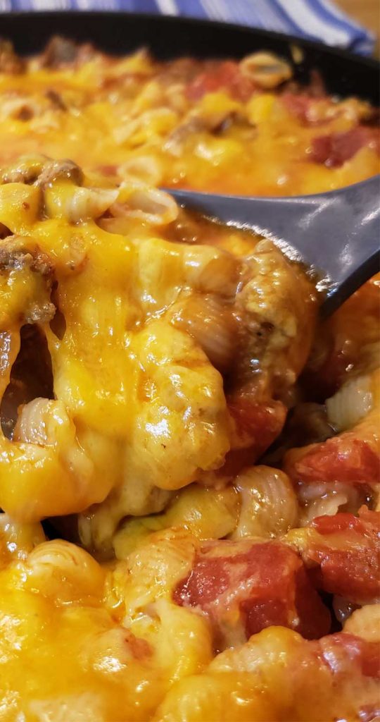 Need a great everyday meal that tastes delicious? Well, I've got you covered with this Cheesy Hamburger Skillet! It's my homemade version of Hamburger Helper, only better because you control what goes in it. #dinnerideas #hamburger #pasta #easyrecipe