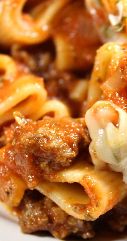 This homemade Italian Pasta and Marinara Meat Sauce will make you feel like you're pulling up a chair with generations of the great little old Italian ladies.