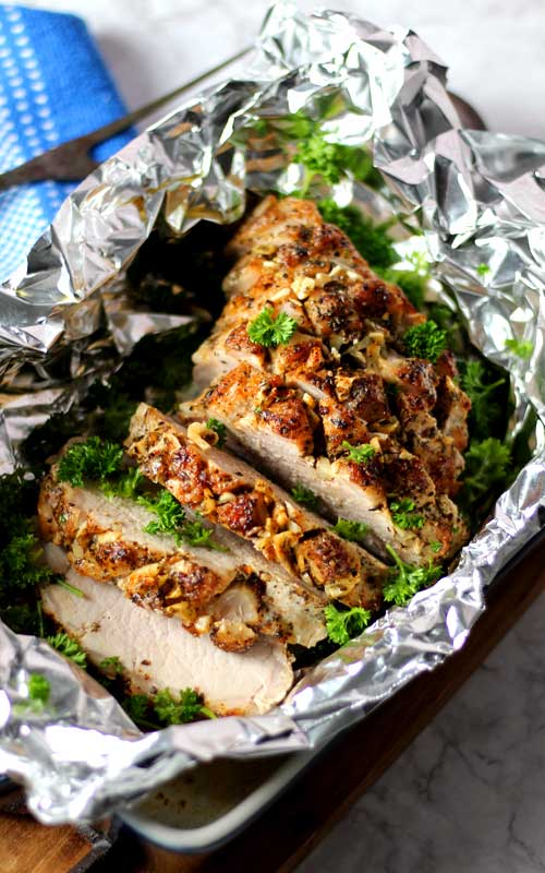 Roasted to tender perfection, this easy Garlic Butter Pork Loin Roast recipe is bursting with garlic butter flavor!